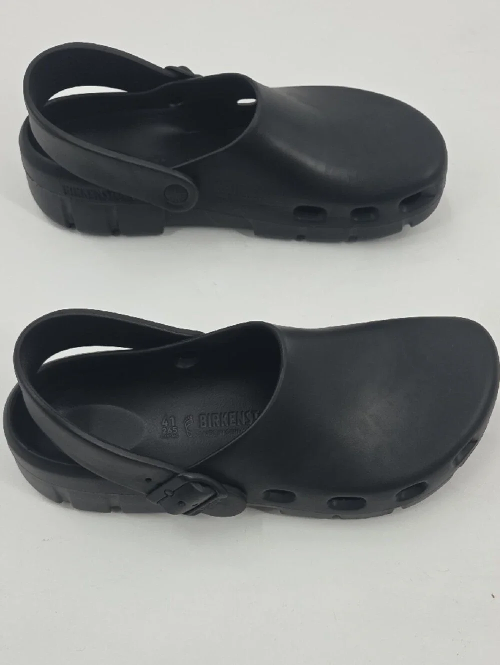 Birkenstock Black Foam Clogs with Heel Strap